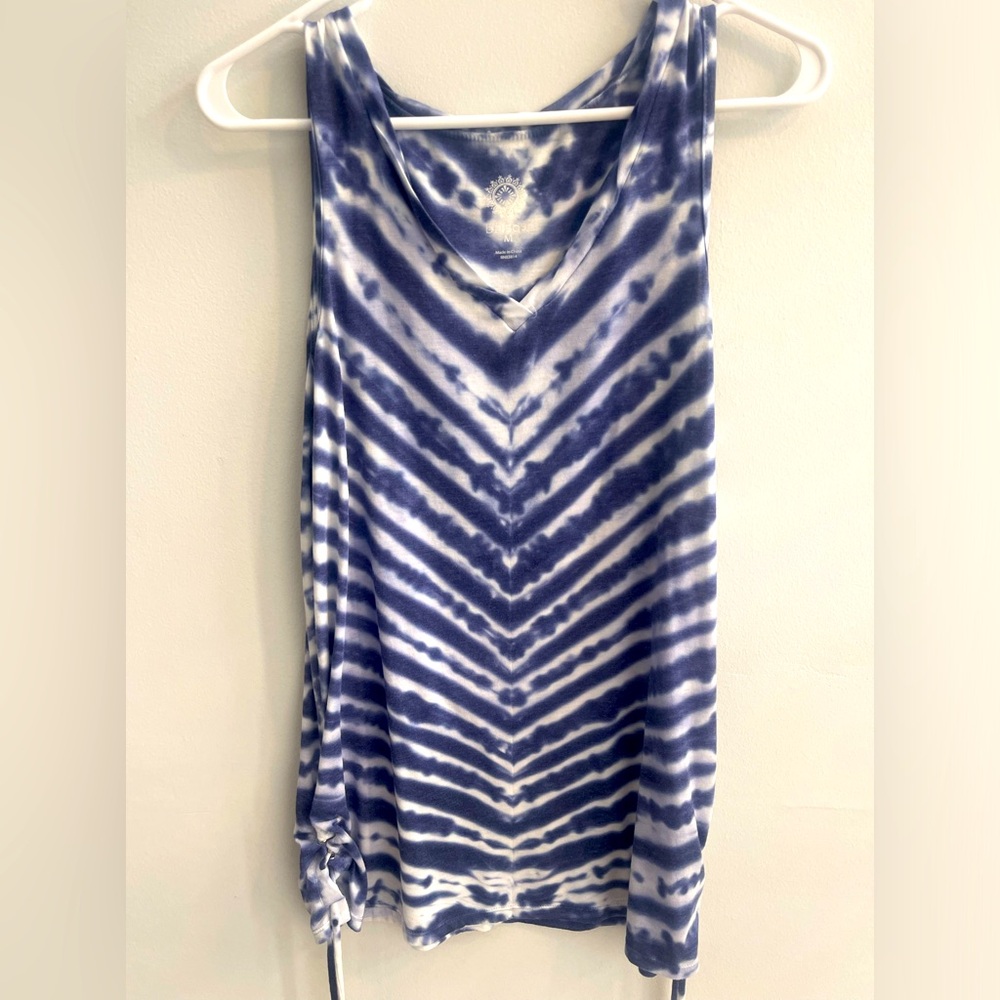 VERY SOFT. Never been worn. Blue and white tie dye top. 50%polyester 50%rayon